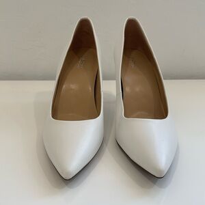Brand new Michael Kors 3” white leather pumps. Size 10M